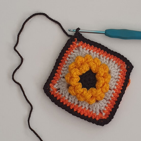 How-to-crochet-an-autumn-granny-square-scarf_square1.jpg?sw=554&q=85