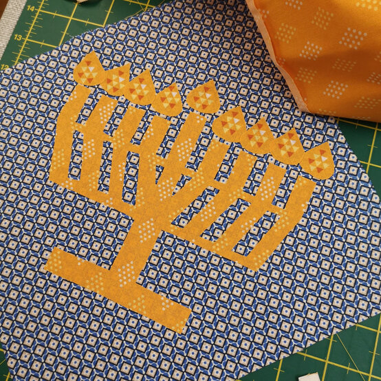 hanukkah_runner_step2_3.jpg?sw=554&q=85