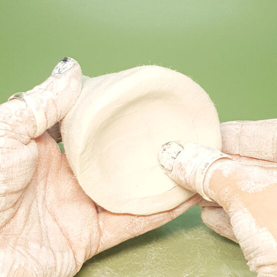 how-to-make-an-air-dry-clay-christmas-gnome_step-2c.jpg?sw=554&q=85