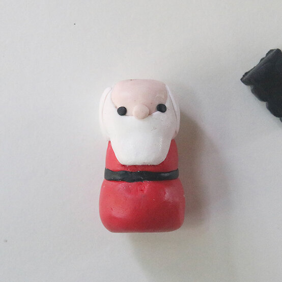 how-to-make-fimo-snow-globes_santa-4.jpg?sw=554&q=85