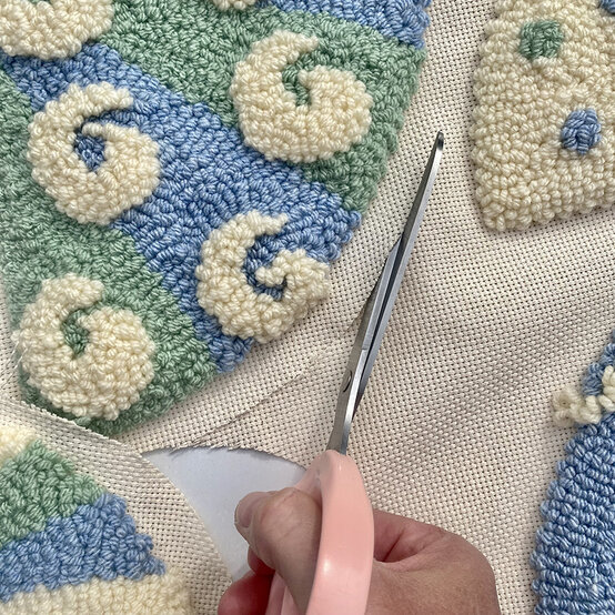 how-to-make-punch-needle-winter-trees_step_8_cutting_tree_sections.jpg?sw=554&q=85