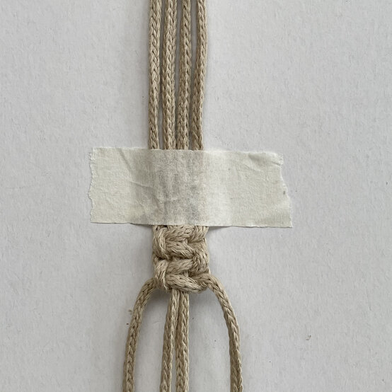 how_to_make_macrame_bunny_plant_pods_step-2.jpg?sw=554&q=85