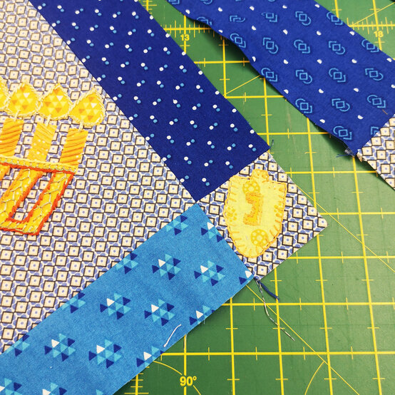 hanukkah_runner_step6_2.jpg?sw=554&q=85