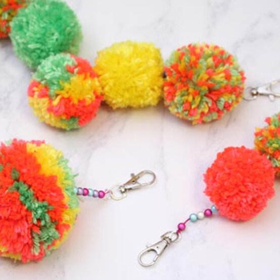 pom-pom-bag-charm.jpg?sw=554&q=85