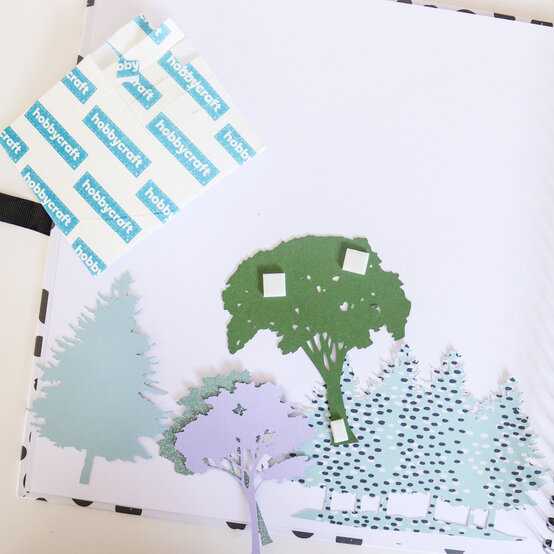 cricut_how-to-make-an-adventure-scrapbook-layout_step4.jpg?sw=554&q=85