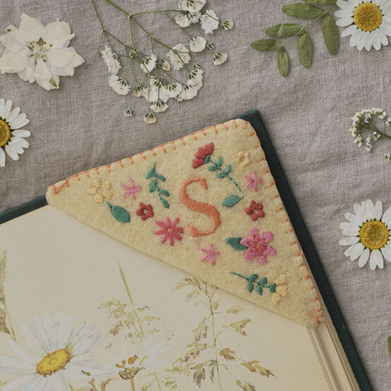 how-to-make-embroidered-bookmarks_floral-bookmark.jpg?sw=554&q=85