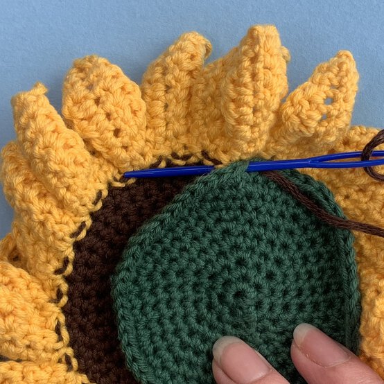 How-to-Crochet-Flowers_Sunflower%20Sewing%20UP%20%282%29.JPEG?sw=554&q=85