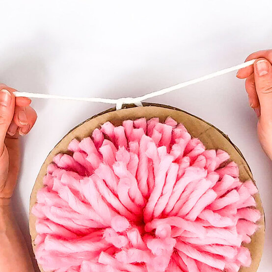 Christmas-Stash-Busting-Ideas_Giant-pompom-Step-3.jpg?sw=554&q=85