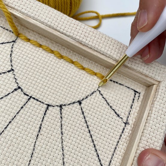 how-to-make-a-punch-needle_sunburst_first_line-step_7.jpg?sw=554&q=85