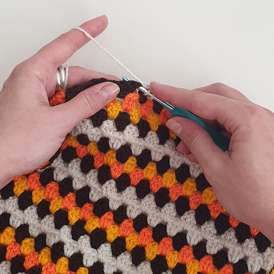 How-to-crochet-an-autumn-granny-square-scarf_granny-stripe.jpg?sw=554&q=85