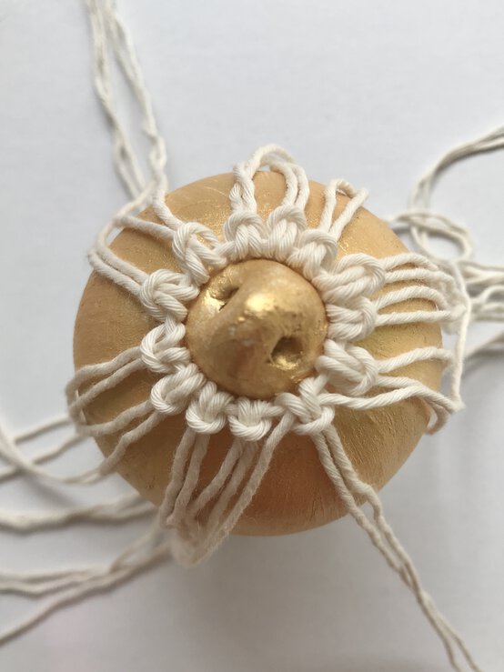 how_to_make_macrame_baubles_gold_tutorial_step-2.jpg?sw=554&q=85