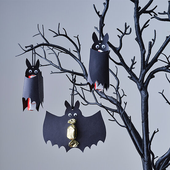ways-to-decorate-a-twig-tree-for-halloween-sweetie-bats.jpg?sw=554&q=85