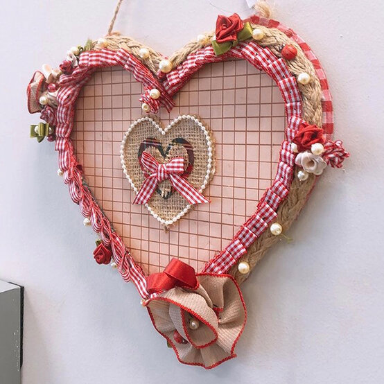artisan-anam-khan-wooden-heart-plaque.jpg?sw=554&q=85