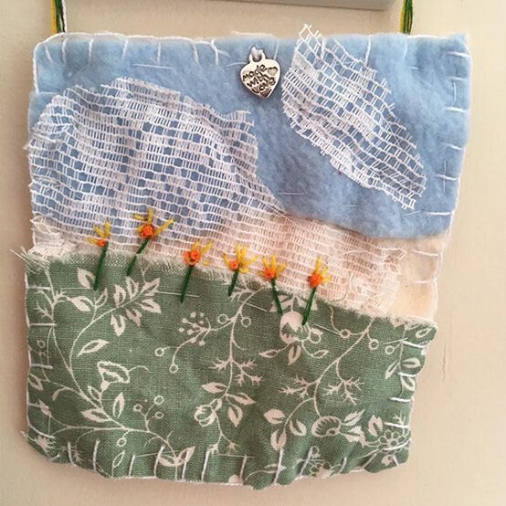 artisan-emma-brown-landscape-embroidered-hanging.jpg?sw=554&q=85