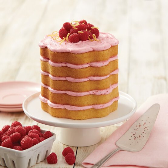 how-to-make-a-lemon-and-raspberry-scalloped-cake.jpg?sw=554&q=85