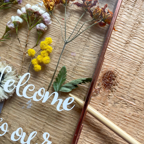 cricut_how_to_make_a_scrapbook_welcome_frame_8.-cricut-glass-frame.jpg?sw=554&q=85