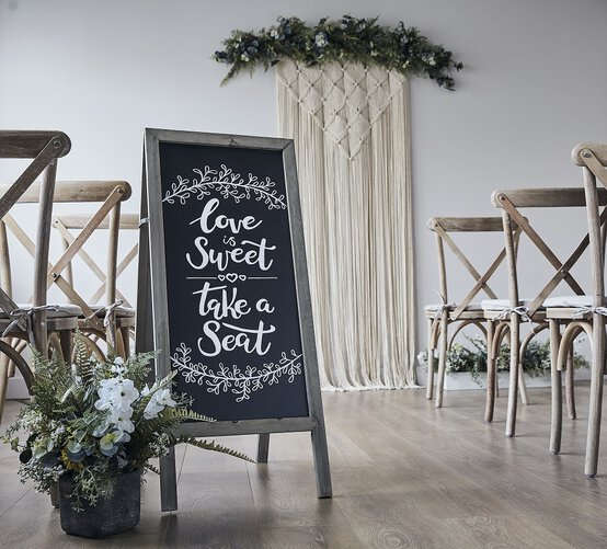 how_to_decorate_a_wedding_chalkboard.jpg?sw=554&q=85