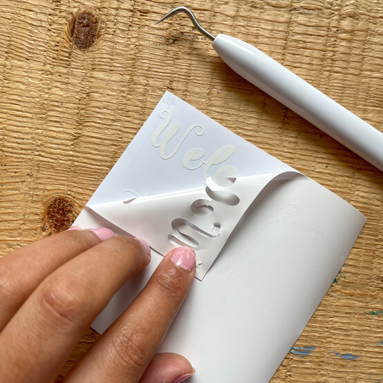 cricut_how_to_make_a_scrapbook_welcome_frame_3.-cricut-glass-frame.jpg?sw=554&q=85