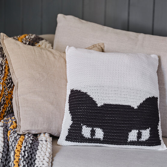 halloween-home-decor-ideas_cat-cushion.jpg?sw=554&q=85
