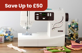 A sewing machine on a table with sewing accessories around it, with the badge Save Up to &pound;50'. Clicking leads to sewing machines offer page