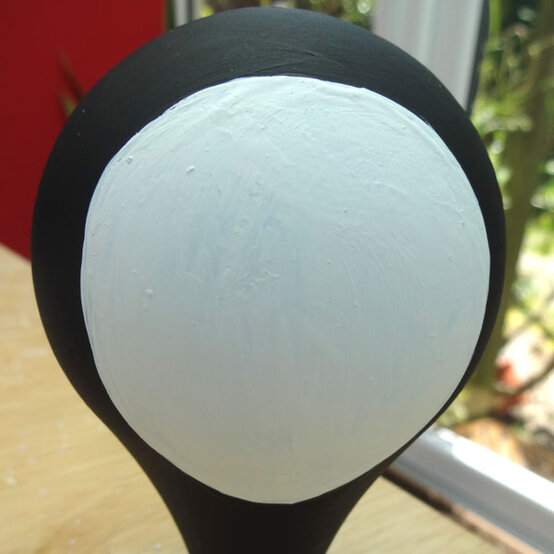 how-to-make-christmas-character-lightbulbs_penguin-step-1b.jpg?sw=554&q=85