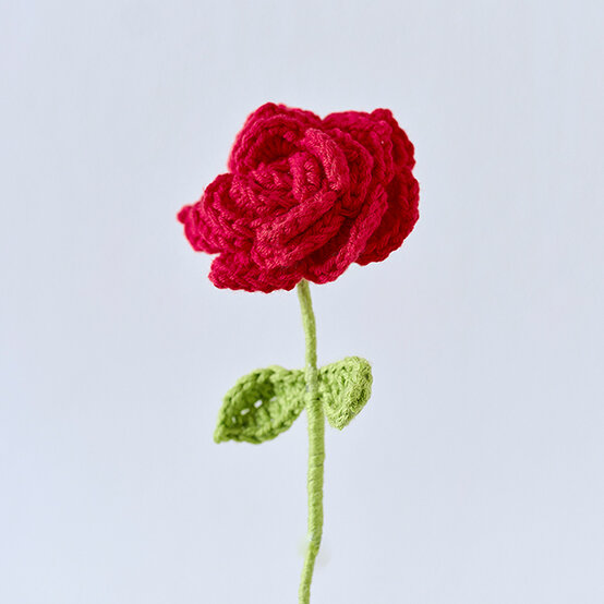 how-to-crochet-a-rose-finished-flower.jpg?sw=554&q=85