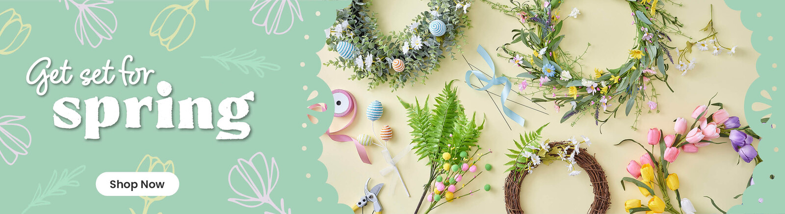 A spring wreath with yellow, pink and purple flowers, alongside two vases with spring flowers in them. Header text says Get set for Spring, everything you need for stylish spring florals, along with a Shop Now button and a roundel with From &pound;4.