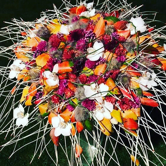 artisan-paula-van-santen-orange-purple-flowers.jpg?sw=554&q=85