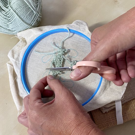 punch_needle_christmas_decorations_yarn_tails__3.jpg?sw=554&q=85