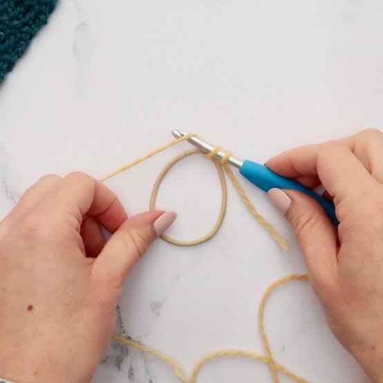 3_Ways_to_Use_Scrap_yarn_Crochet%20hair%20tie%201.jpeg?sw=554&q=85