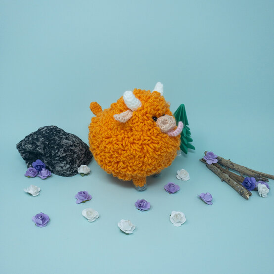 how-to-crochet-a-highland-cow_complete_sidehero.jpg?sw=554&q=85