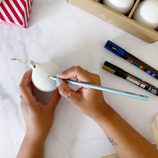 personalised-decorated-ceramic-baubles-1.jpg?sw=554&q=85