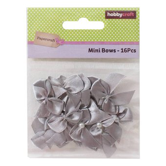 Mini Silver Pearl Bows 16 Pack