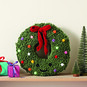 How to Crochet a Christmas Wreath Cushion image number 1
