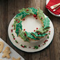 How to Decorate a Holly Wreath Cake image number 1